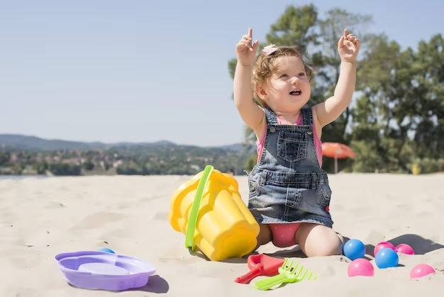 Happy toddler playing on the beach in Dubai - a perfect family-friendly destination