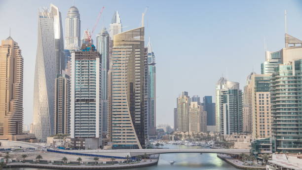 Skyline of Dubai Marina with modern skyscrapers, related to an article on ownership of flats in Burj Khalifa.